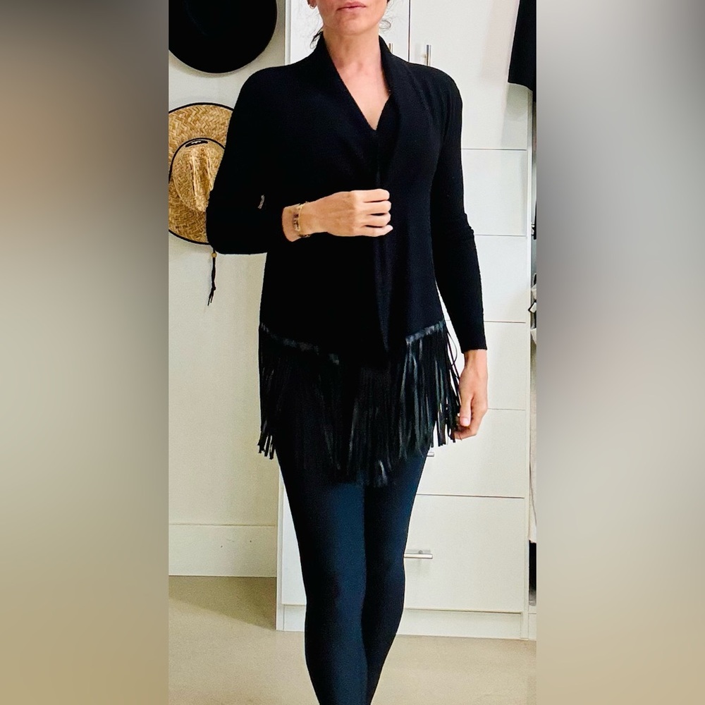 Black soft open sweater with adorable fringe detail